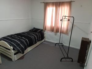 En eller flere senge i et værelse på Casa del Carmen