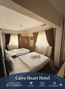Ένα ή περισσότερα κρεβάτια σε δωμάτιο στο Cairo Heart Hotel By GH For Hotels