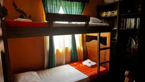 Giường trong phòng chung tại Casa Villa de Leyva