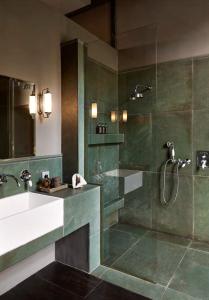 a bathroom with a shower and a sink and a tub at Ballotina, Tulbagh Cape Wineland in Tulbagh +35 photos