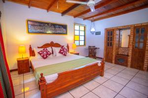 Ένα ή περισσότερα κρεβάτια σε δωμάτιο στο Golden Villa Hikkaduwa