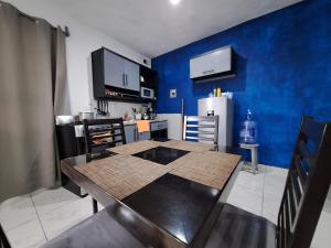 Ένα ή περισσότερα κρεβάτια σε δωμάτιο στο Casa Norita