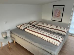 Ένα ή περισσότερα κρεβάτια σε δωμάτιο στο Schweden Chalet, Haus 1 +3 φωτογραφίες