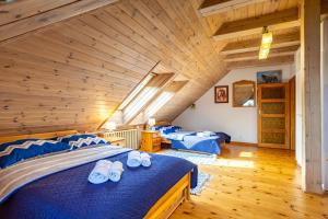 Postel nebo postele na pokoji v ubytování Family Lake House