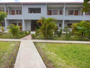 Κήπος έξω από το Villas Residencial - Massinga