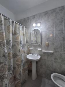 Ванная комната в Hotel Residencial Lo de Pepe