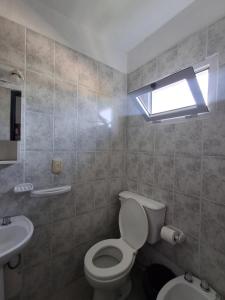 Ванная комната в Hotel Residencial Lo de Pepe