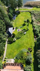 an aerial view of a yard with a garden at Family Lake House in Mikołajki