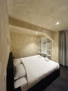 Postel nebo postele na pokoji v ubytování Fiori private wellness en hotel