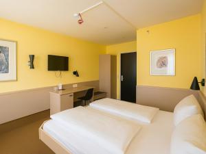 Μια τηλεόραση ή/και κέντρο ψυχαγωγίας στο DORMERO Hotel Schwäbisch Hall