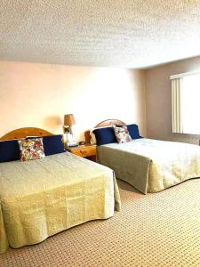 En eller flere senge i et værelse på #146 Golf, SkI, Pool Pass Walk to hill