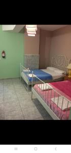 Ένα ή περισσότερα κρεβάτια σε δωμάτιο στο Albergue juvenil