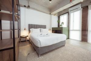 Ένα ή περισσότερα κρεβάτια σε δωμάτιο στο Enchanted Elegance in Laureles