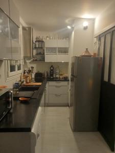 Η κουζίνα ή μικρή κουζίνα στο Chambre pour une personne