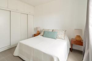 En eller flere senge i et værelse på Blue Haven + 22 billeder