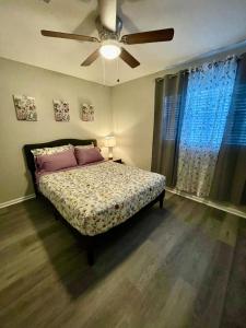 Ένα ή περισσότερα κρεβάτια σε δωμάτιο στο The Serenity Haven Ocean Springs Getaway