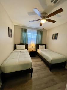 Ένα ή περισσότερα κρεβάτια σε δωμάτιο στο The Serenity Haven Ocean Springs Getaway