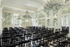 a room with rows of chairs in a room at Rocco Forte Hotel De La Ville in Rome +129 photos