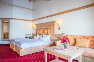 Ένα ή περισσότερα κρεβάτια σε δωμάτιο στο Bergvital Hotel Todtnau