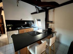 Кухня или мини-кухня в Nid douillet proche orly aéroport
