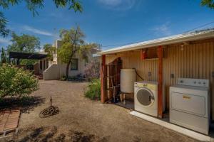 a washer and dryer sitting outside of a house at Casita #7 in Tucson