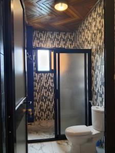 Phòng tắm tại Majeo