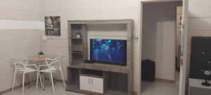 Et tv og/eller underholdning på Unit51 MarinaGlen Holiday Resort