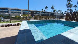 Swimmingpoolen hos eller tæt på Cond Pe na Areia com Piscina Privativa