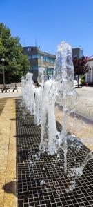 a group of ice sculptures sitting on a metal grate at Lavanda Termas de São Pedro do Sul in Bicas +15 photos