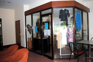 a display case in a store with clothes in it at Hotel Seri Malaysia Genting Highlands in Genting Highlands