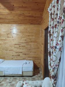 Photo de la galerie de l'établissement Flora Pansiyon Çıralı, à Kemer