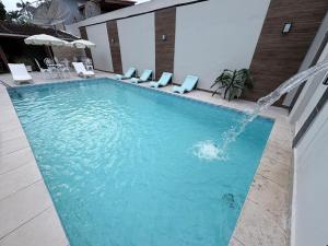 Swimmingpoolen hos eller tæt på Juquehy Studios 7 ou 9