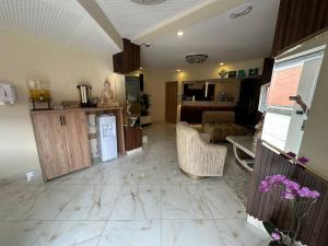 Η κουζίνα ή μικρή κουζίνα στο Hotel Aikos