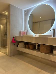 a bathroom with a sink and a mirror at Leilighet i hus in Sarpsborg +24 photos