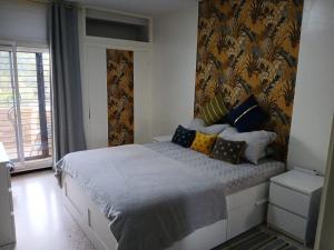 Ένα ή περισσότερα κρεβάτια σε δωμάτιο στο Dar Najat