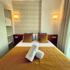 Ένα ή περισσότερα κρεβάτια σε δωμάτιο στο Rizkian pyramids view INN