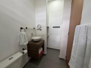 Ένα μπάνιο στο Atardeceres casa de playa +18 φωτογραφίες