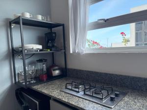 Η κουζίνα ή μικρή κουζίνα στο Atardeceres casa de playa