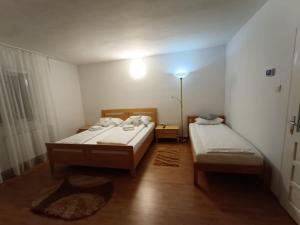 Ένα ή περισσότερα κρεβάτια σε δωμάτιο στο Casa Dyasof