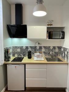 Køkken eller tekøkken på Chez Jean-Yves et Zoé - LE CARPE DIEM - Au calme, Très propre, Proche parkings