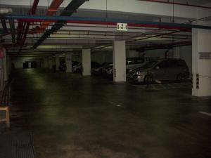 a parking garage with cars parked in it at Hotel Seri Malaysia Genting Highlands in Genting Highlands