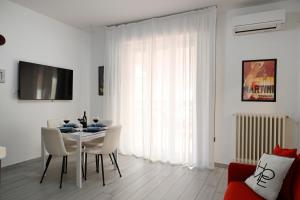 TV a/nebo společenská místnost v ubytování A casa di Eva e Paolo