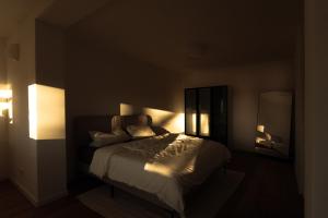 Ένα ή περισσότερα κρεβάτια σε δωμάτιο στο Konstanz Lakeside Apartment