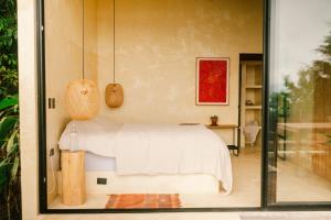 Ένα ή περισσότερα κρεβάτια σε δωμάτιο στο Orilla Casas en Ati +13 φωτογραφίες