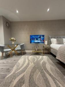 Ένα ή περισσότερα κρεβάτια σε δωμάτιο στο Premium Luxe Collection