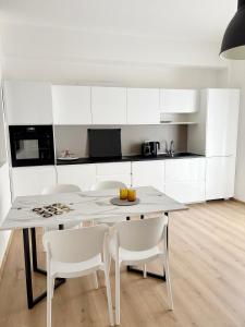 Η κουζίνα ή μικρή κουζίνα στο Verde Acqua Suite