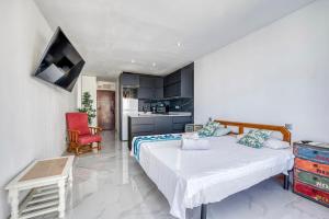 Ένα ή περισσότερα κρεβάτια σε δωμάτιο στο Torremolinos Center - Close to the Beach