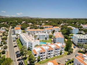 an aerial view of a city with buildings at Manelinha Apartment - cozy apartment with pool and beach in Quarteira