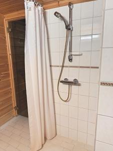 Koupelna v ubytování Villa Joiku + 15 fotografií