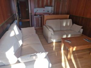 Et opholdsområde på Plaza Pradollano edf Impala